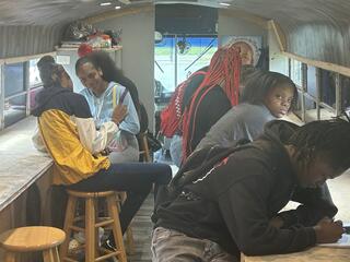 Covenant School students on mobile paint bus 